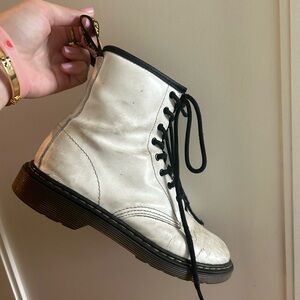 White and black Doc Martens boots